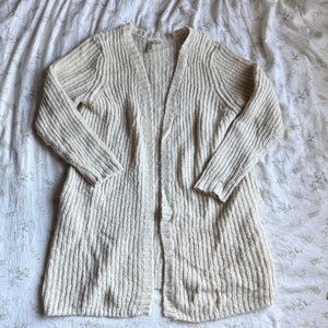 Cream knit cardigan with side pockets size Medium in great condition never worn